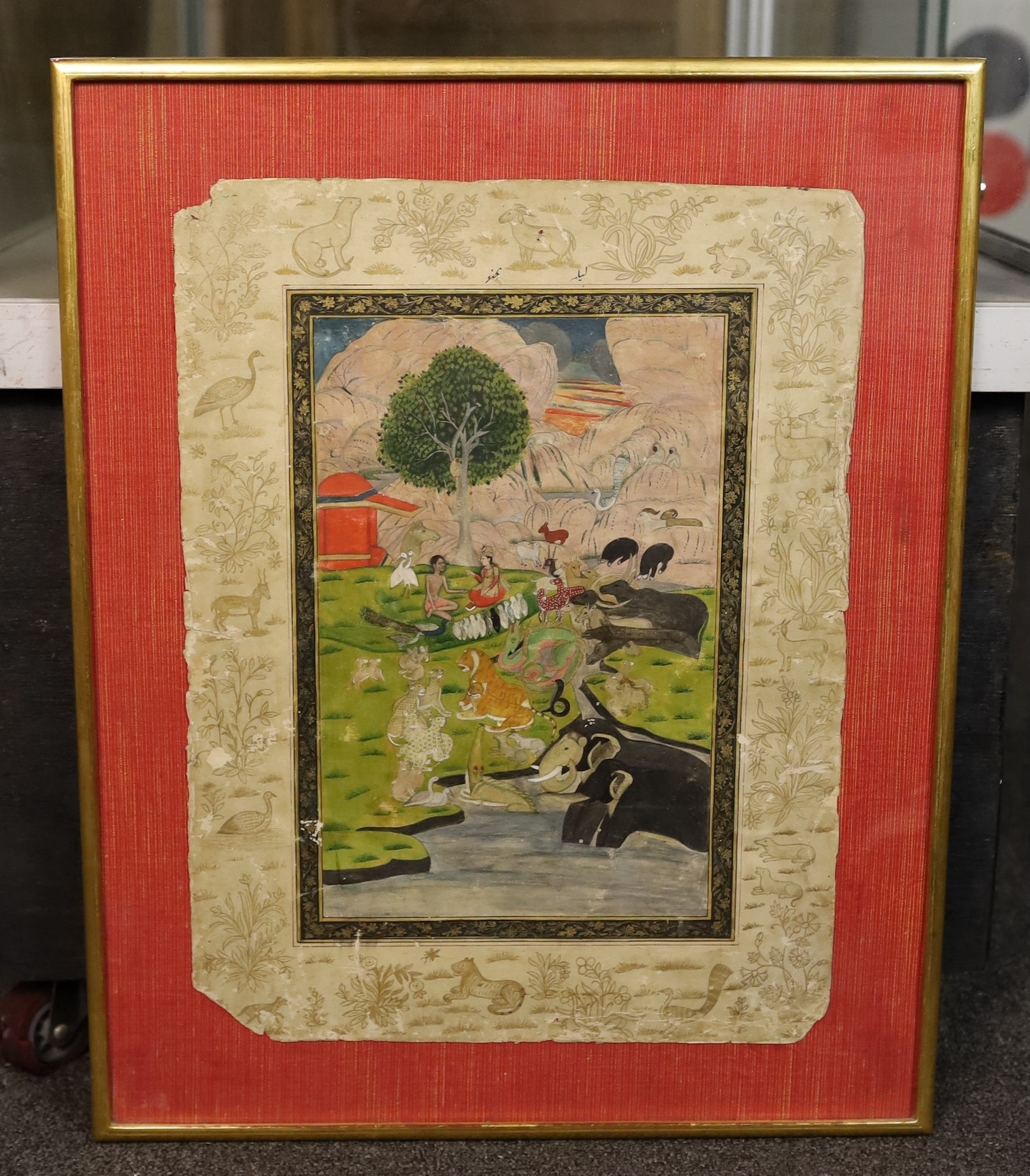 Indian school (19th century) , A Prince meeting an ascetic seated in a landscape with a menagerie of animals, ink and watercolour on paper, 29 x 18.5cm